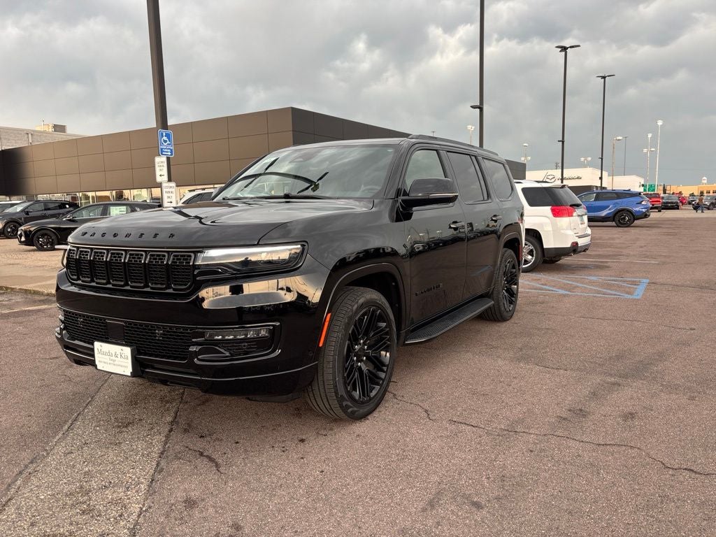 2023 Jeep Wagoneer Series II in Diamond Black Crystal Pearlcoat — front three-quarter view
