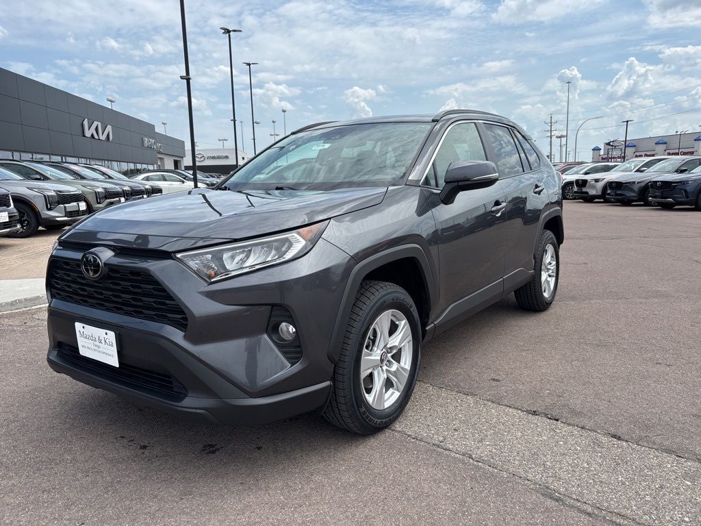 2020 Toyota RAV4 XLE in Magnetic Gray Metallic — front three-quarter view