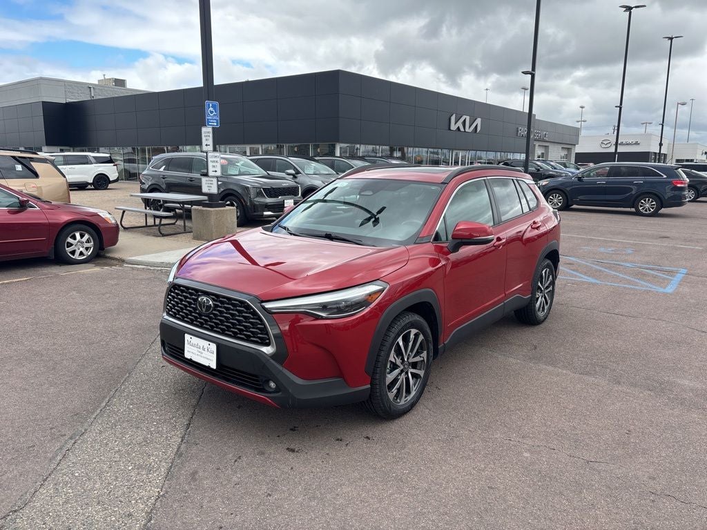 2023 Toyota Corolla Cross XLE in Red — front three-quarter view