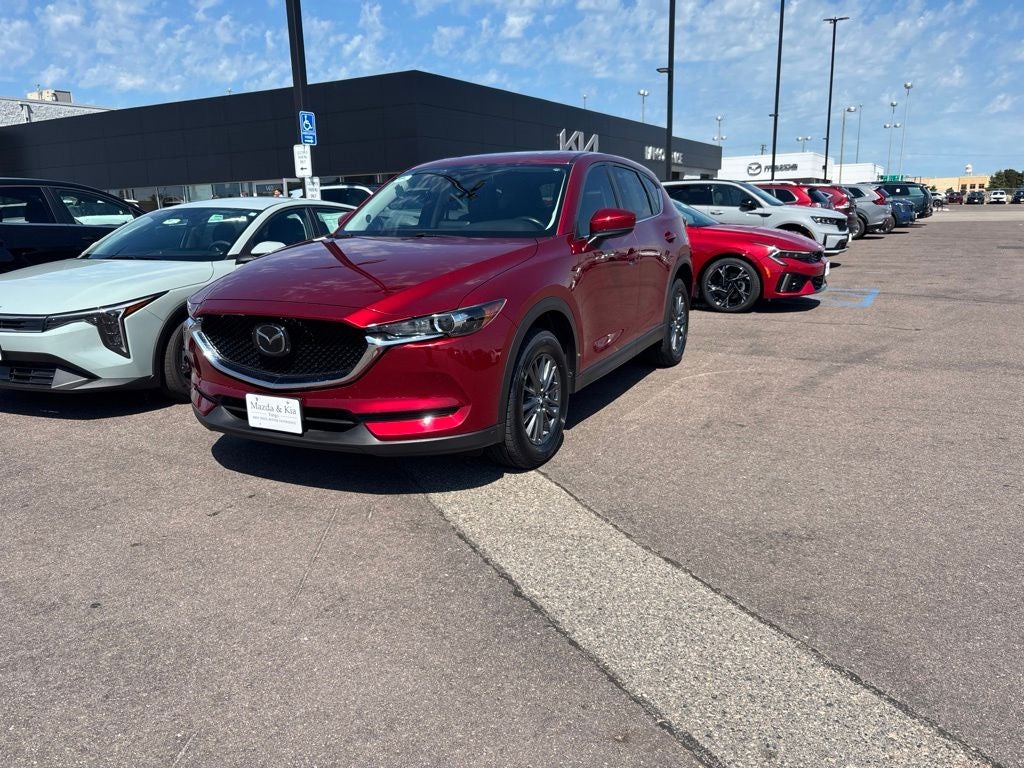 2020 Mazda Mazda CX-5 Touring in Soul Red Crystal Metallic — front three-quarter view